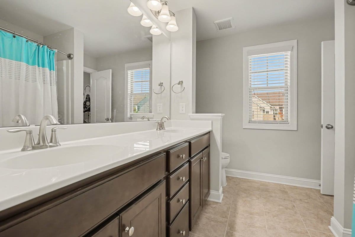 Bath 2 twin vanity, tile floor - 1115 Lotus Lilly Drive, Durham, NC 27713