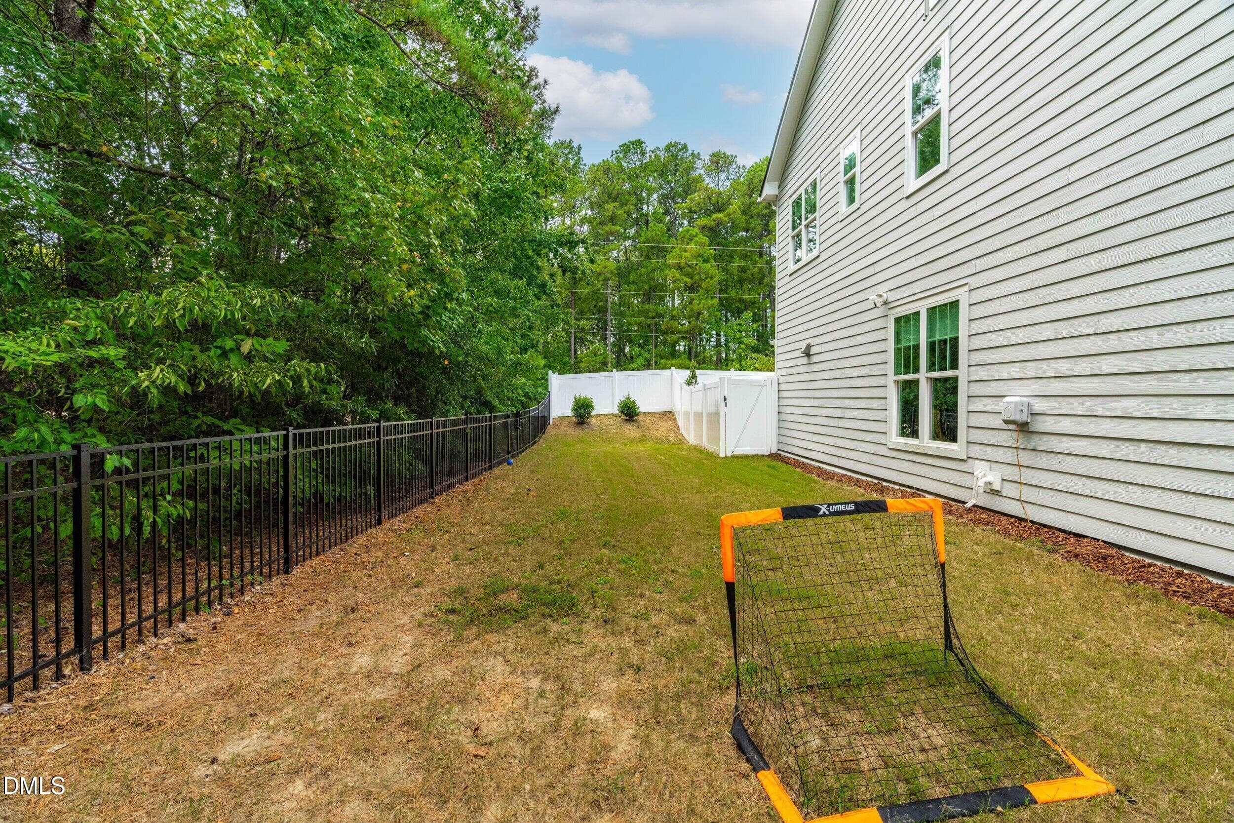 Side Yard - Fenced In - 529 Kings Lake Way, Durham, NC 27703