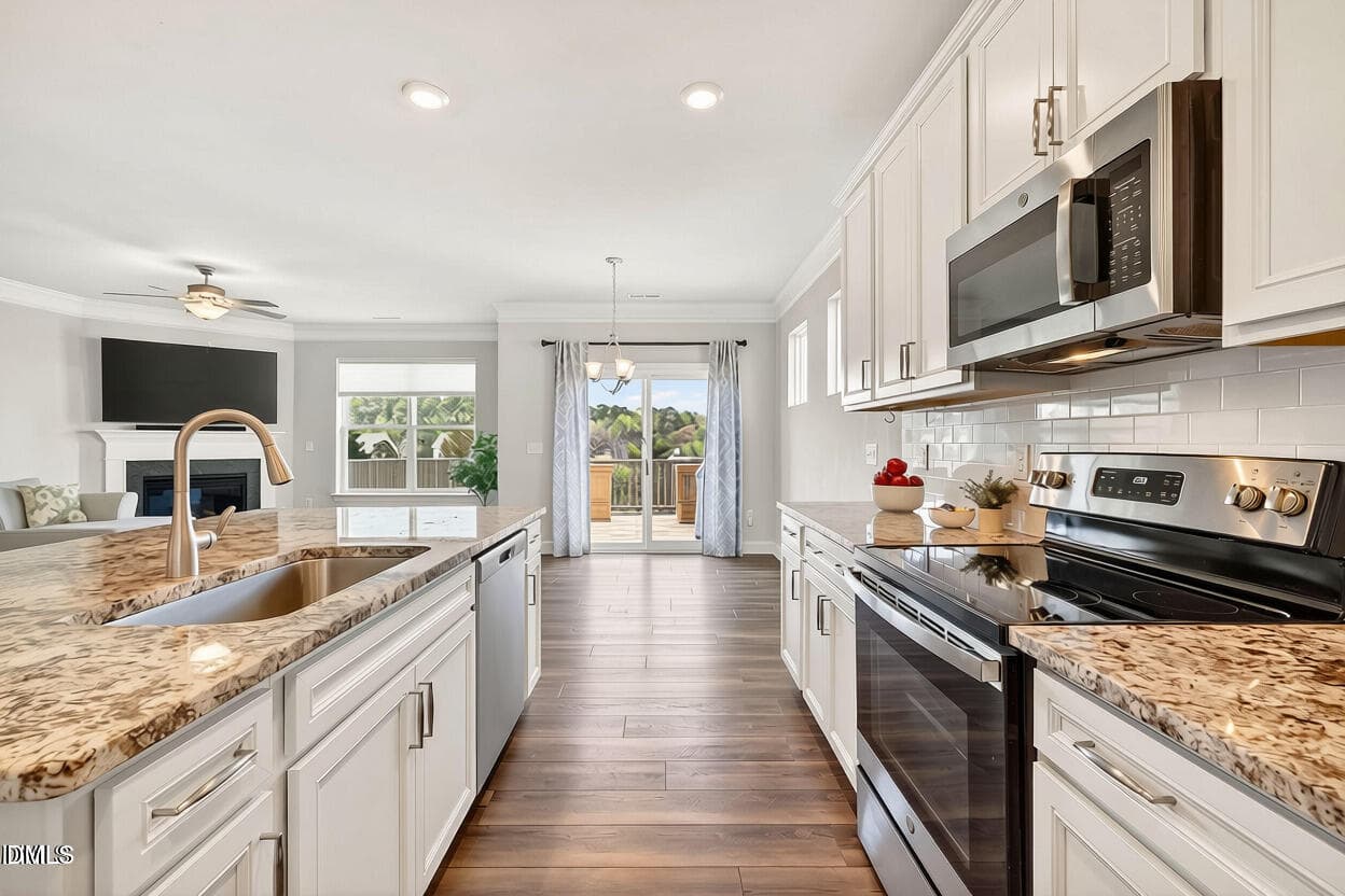 Kitchen to dining empty - 4324 Beckel Road, Willow Springs, NC 27592, Willow Springs