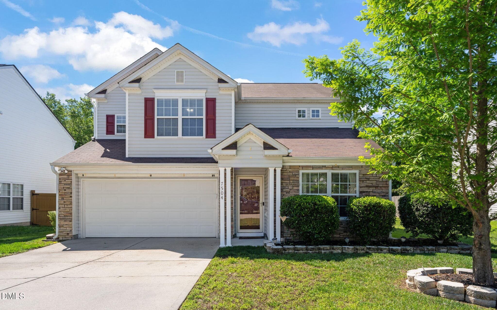 Front of house with driveway - 7504 Brighton Village Drive, Raleigh, NC 27616