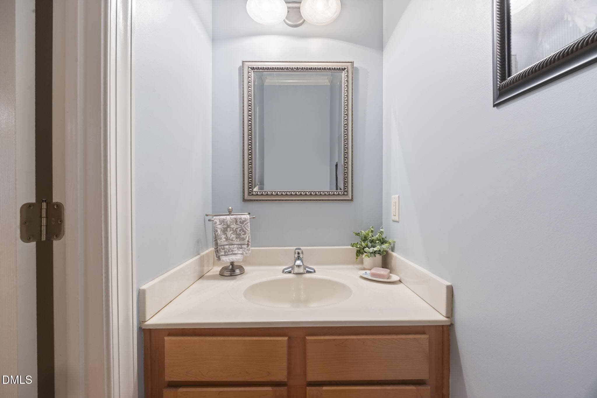 Quaint powder room - 109 Menteith Court, Apex, NC 27502