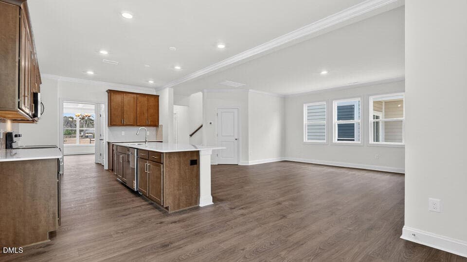 BREAKFAST AREA, KITCHEN, & FAMILY ROOM - 506 Dorset Stream Drive, Fuquay Varina, NC 27526