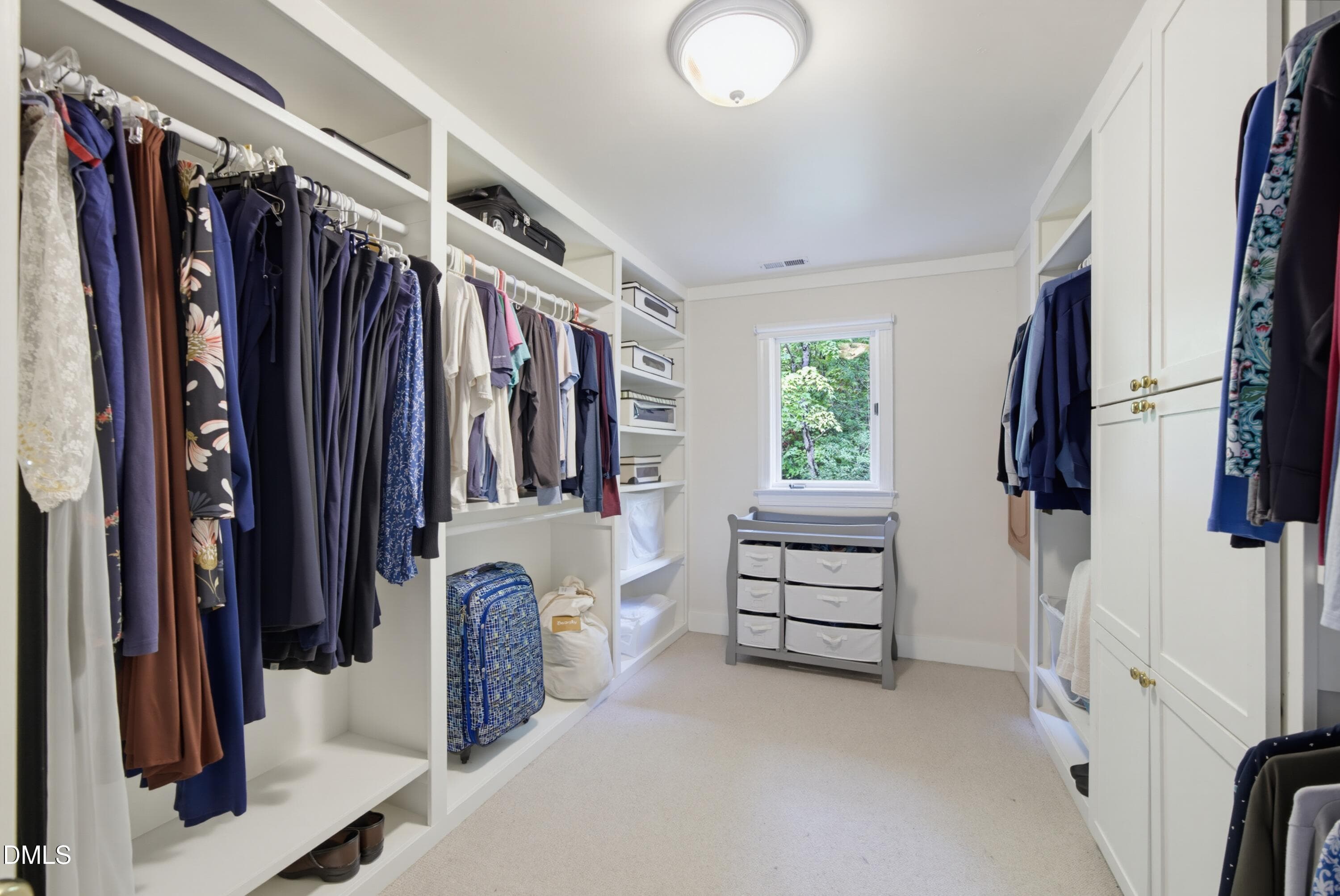 Exspansive closet with laundry chute - 1105 Erins Way Lane, Raleigh, NC 27614