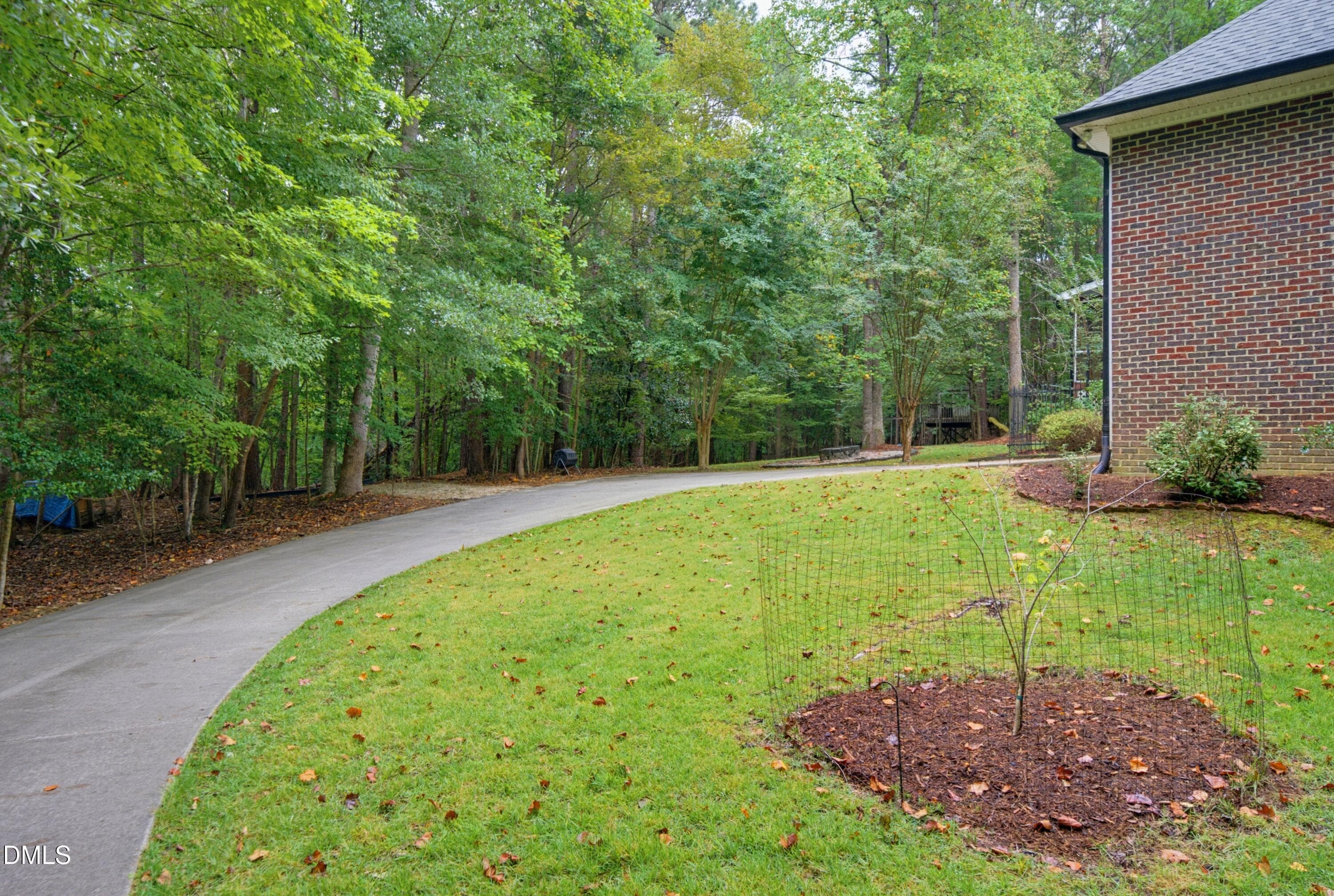 Driveway to rear facing garage - 1105 Erins Way Lane, Raleigh, NC 27614