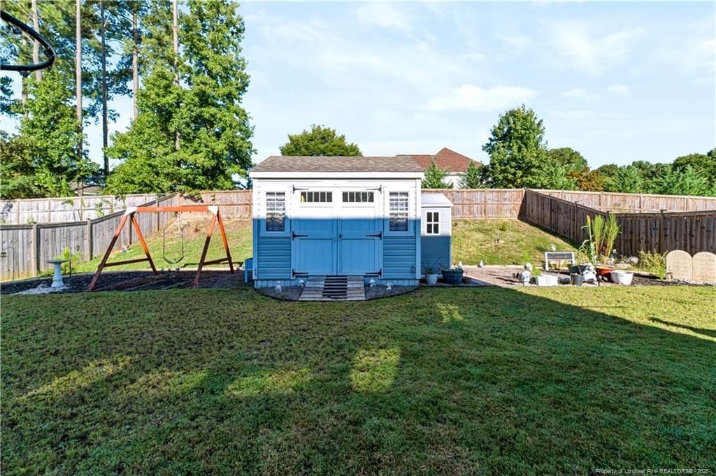 Backyard - Storage Building View - 209 Red Cedar Way, Fuquay Varina, NC 27526