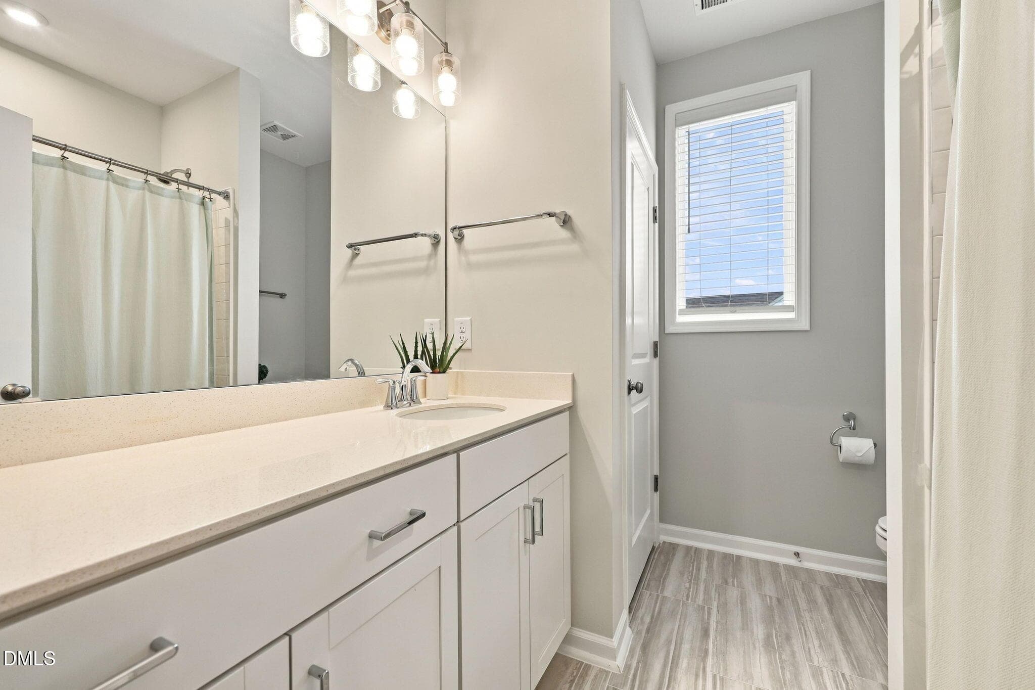 SECONDARY FULL HALL BATHROOM - 4820 Heathshire Drive, Raleigh, NC 27616