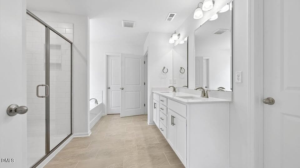 PRIMARY SUITE BATHROOM - 368 Swift Creek Farm Lane, Clayton, NC 27520