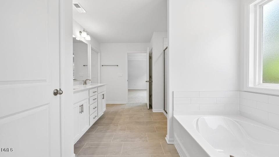 PRIMARY SUITE BATHROOM - 368 Swift Creek Farm Lane, Clayton, NC 27520