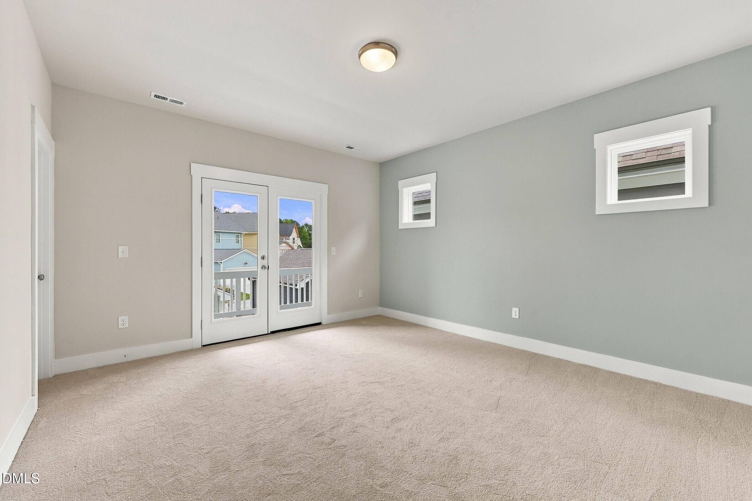 Primary with balcony - 780 Lunar Light Drive, Wendell, NC 27591