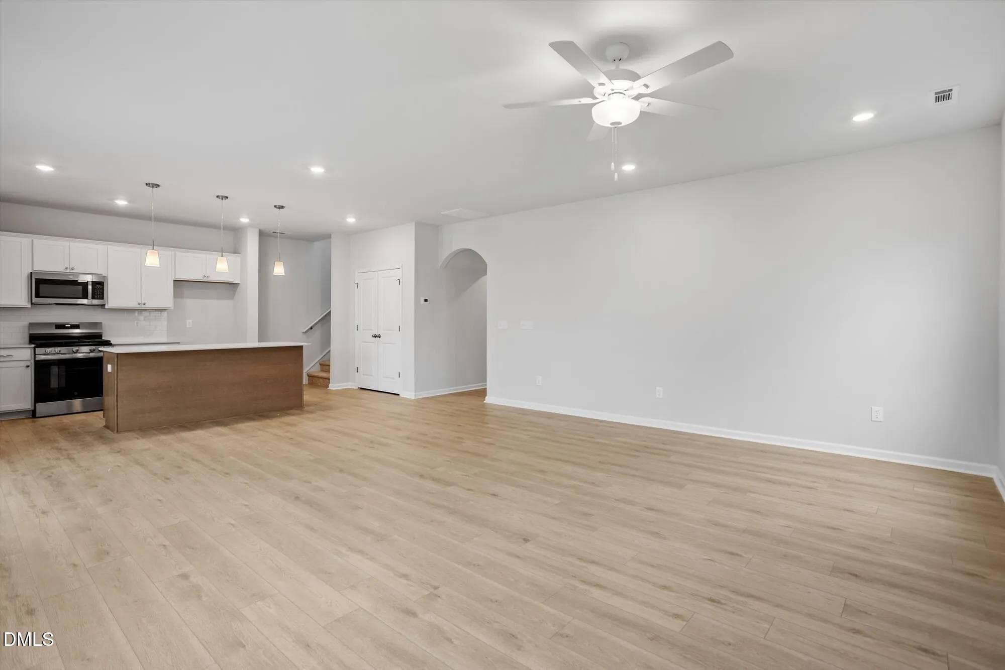 great room to stairs - 32 Plantation Drive, Youngsville, NC 27596