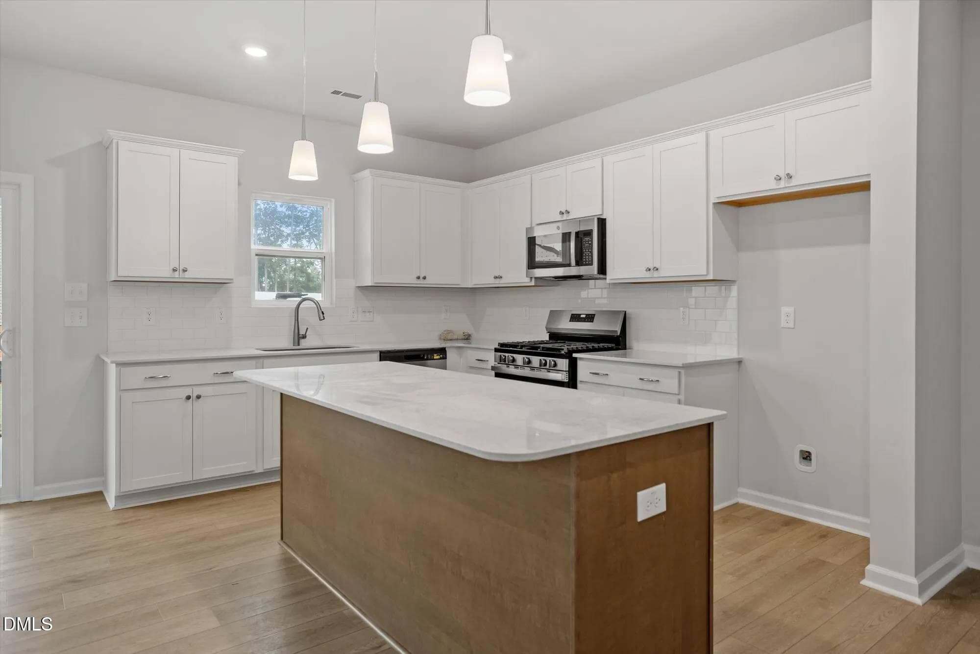 kitchen side view - 32 Plantation Drive, Youngsville, NC 27596