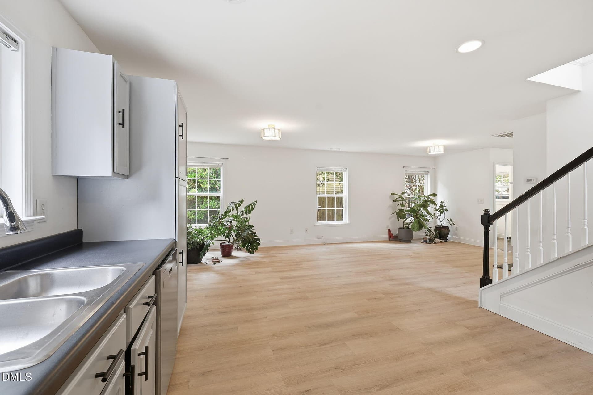 29 Kitchen, stairs, and half bathroom - 197 Depot Ridge Road, Garner, NC 27529