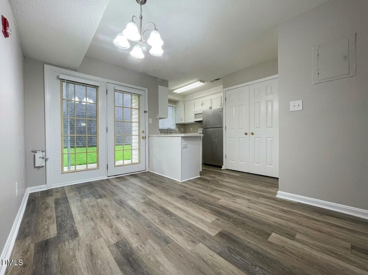 Dining Area and Kitchen - 4703 Blue Bird Court F, Raleigh, NC 27606, Raleigh