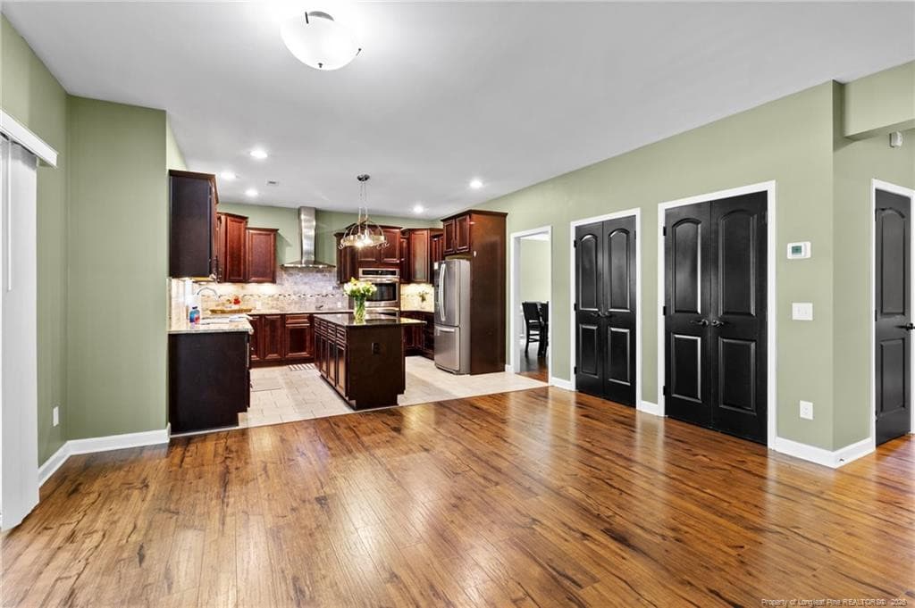 Eat-In Kitchen into Kitchen - 255 Gwendolyn Way, Fuquay Varina, NC 27526