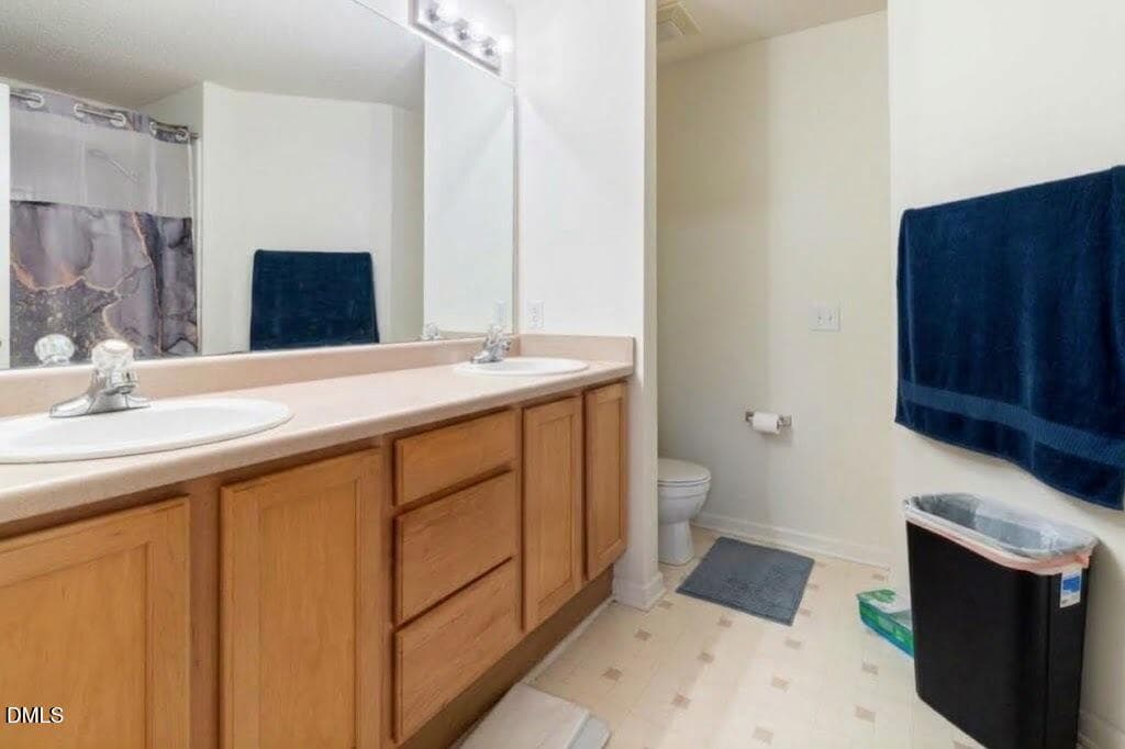 primary bath declutter virtually staged - 4414 Pottery Lane, Raleigh, NC 27616