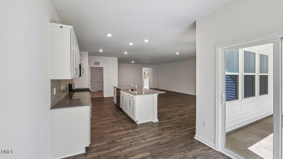 BREAKFAST AREA & DOOR TO REAR PATIO - 441 Conifer Street, Sanford, NC 27332