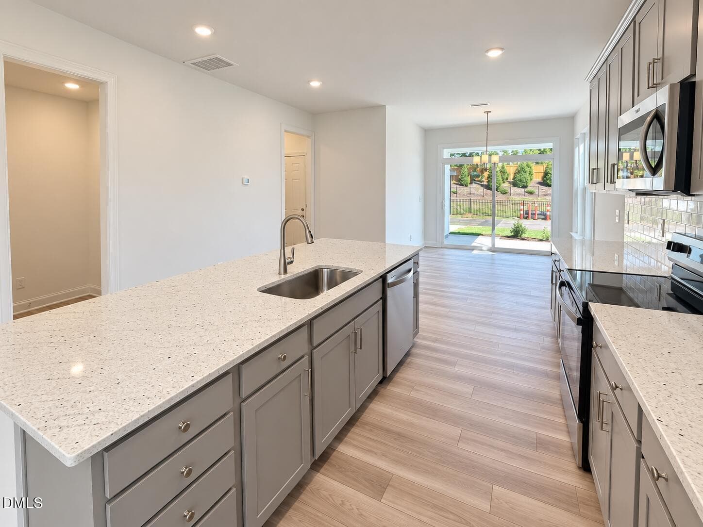 View from kitchen into Nook and Dining - 532 Traditions Grande Boulevard, Wake Forest, NC 27587