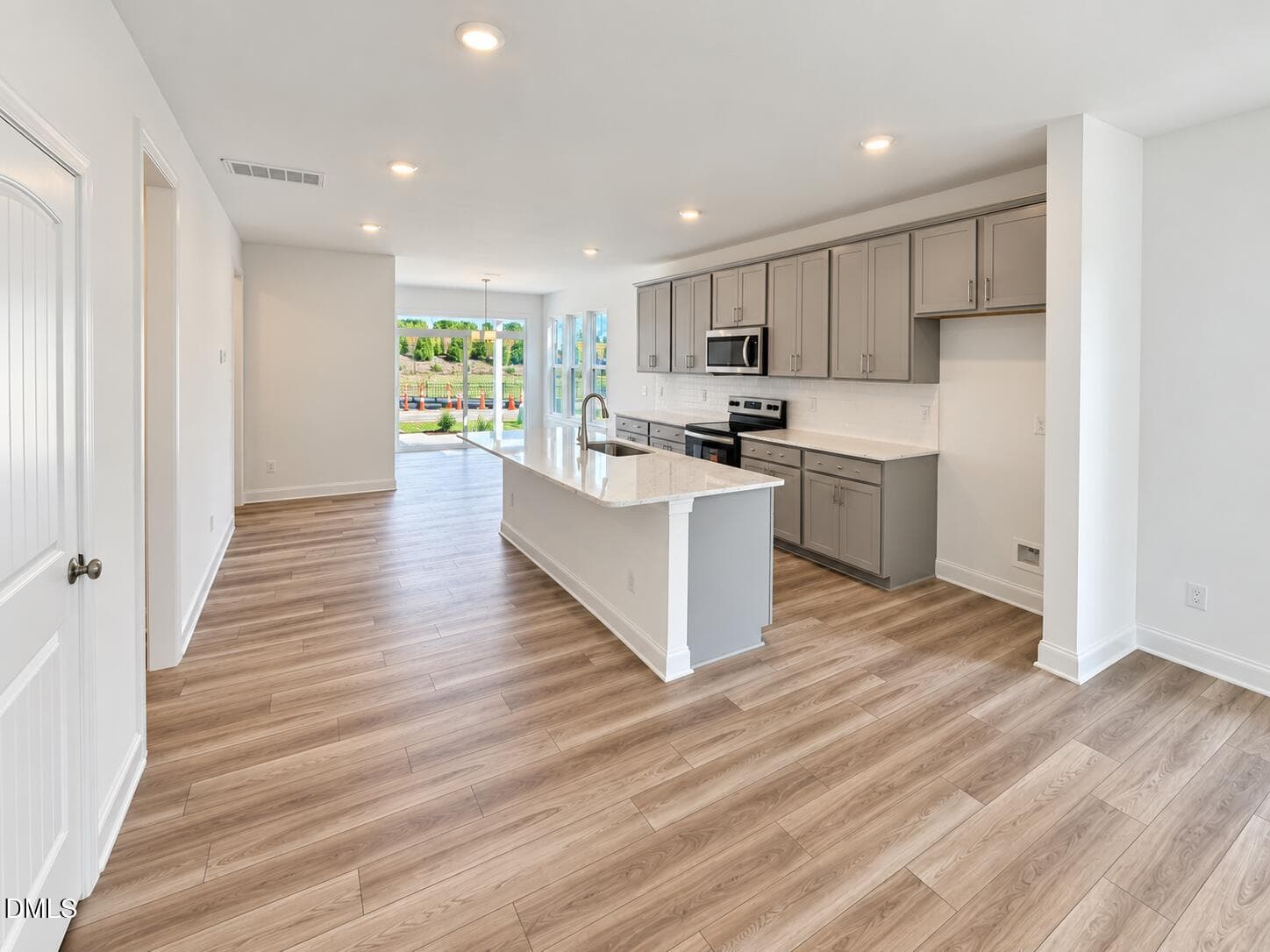 View from LR into Kitchen and DR - 532 Traditions Grande Boulevard, Wake Forest, NC 27587