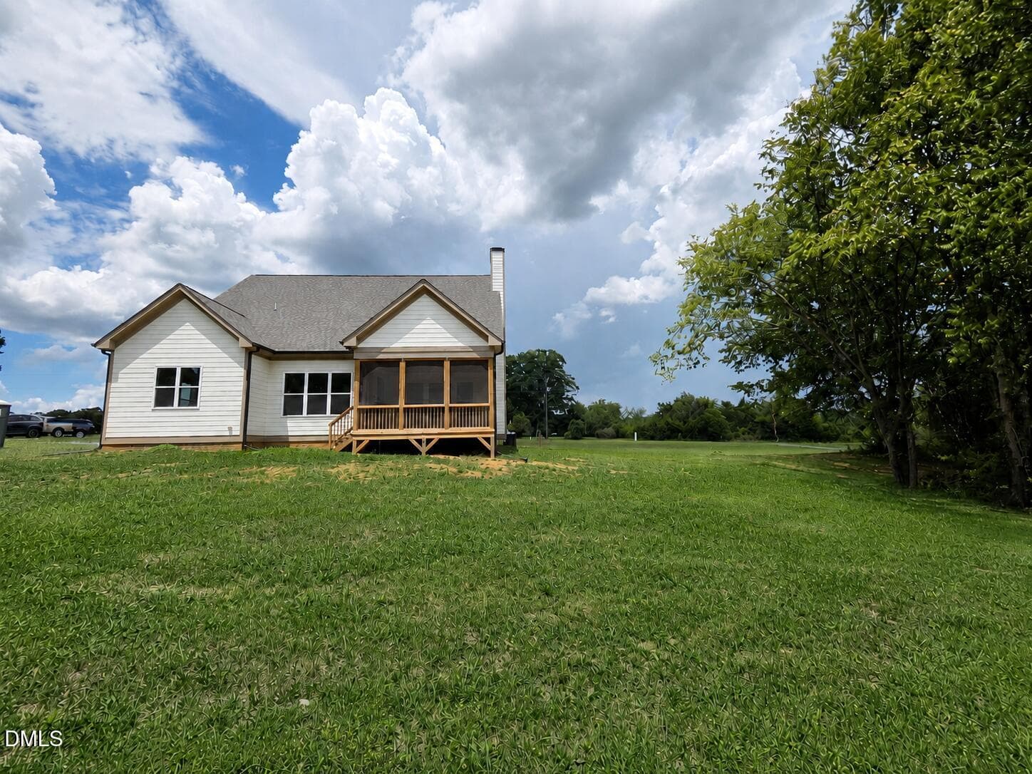 back exterior - 5545 Silk Hope Gum Springs Road, Siler City, NC 27344
