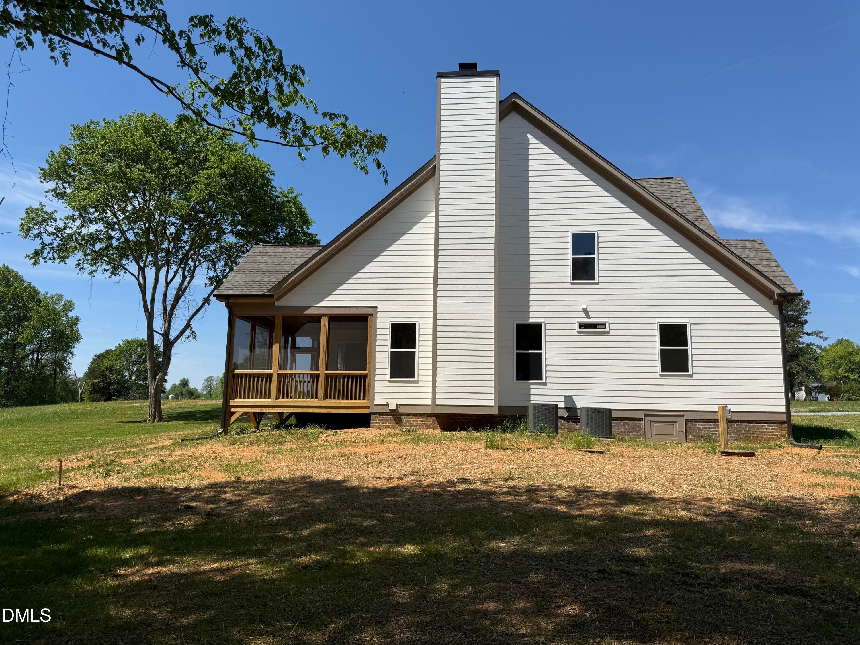 side exterior - 5545 Silk Hope Gum Springs Road, Siler City, NC 27344
