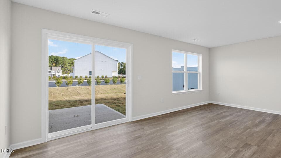 DINING ROOM AND LIVING ROOM - 32 Bee Garden Court, Angier, NC 27501