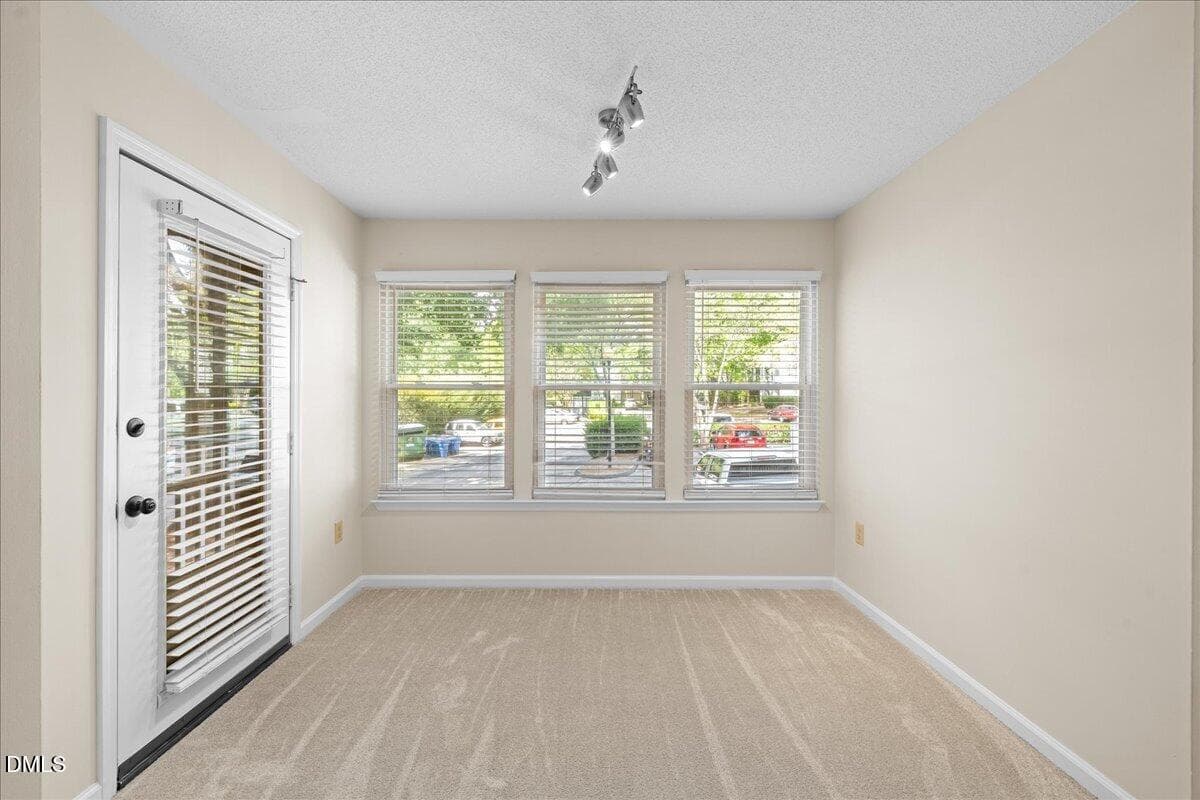Sunroom Door to Balcony - 1301 Hillbrow Lane 203, Raleigh, NC 27615