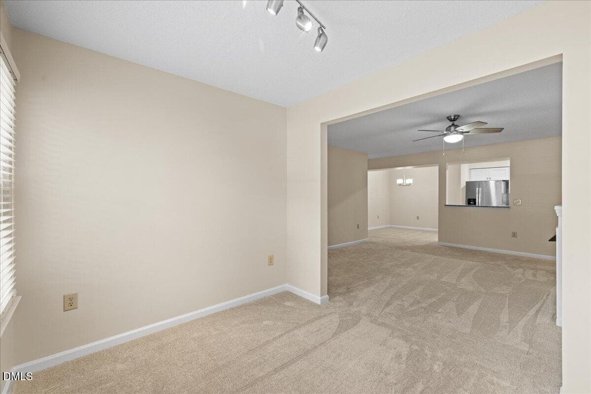 Sunroom leading into Living Room - 1301 Hillbrow Lane 203, Raleigh, NC 27615