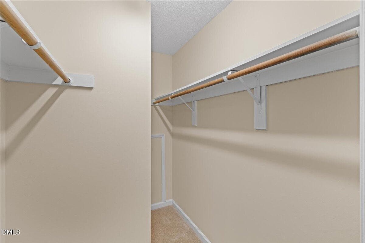 Primary Bedroom Closet - 1301 Hillbrow Lane 203, Raleigh, NC 27615