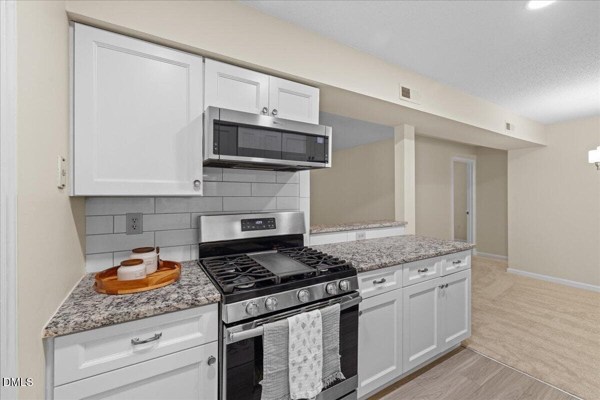 Tile Backsplash - 1301 Hillbrow Lane 203, Raleigh, NC 27615