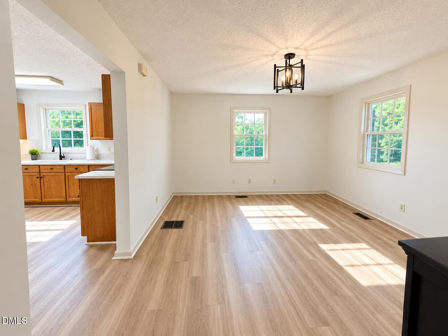 Sunlit Open-Plan Dining and Kitchen - 5945 Craig Road, Durham, NC 27712