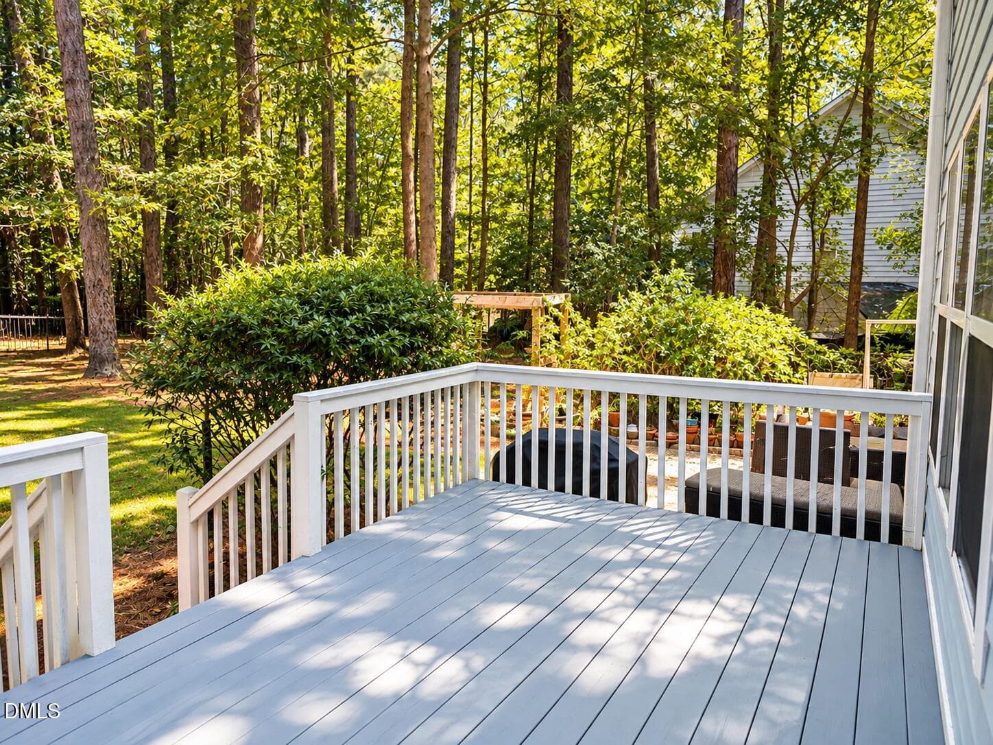 Sunlit Deck Overlooking a Wooded Backyar - 7024 Oviedo Drive, Raleigh, NC 27603