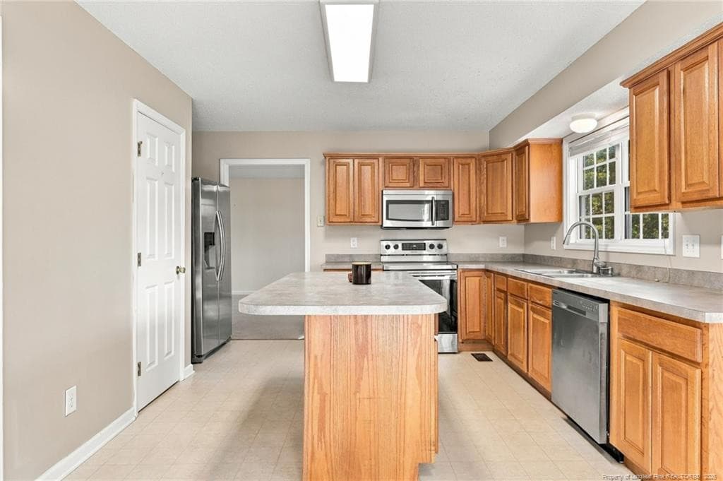 Kitchen with Fridge - 120 Green Links Drive, Cameron, NC 28326, Cameron