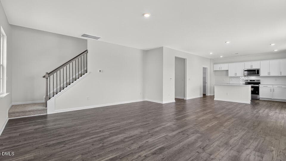 LIVING ROOM AND STAIRWELL - 504 Shorthorn Drive, Wake Forest, NC 27587