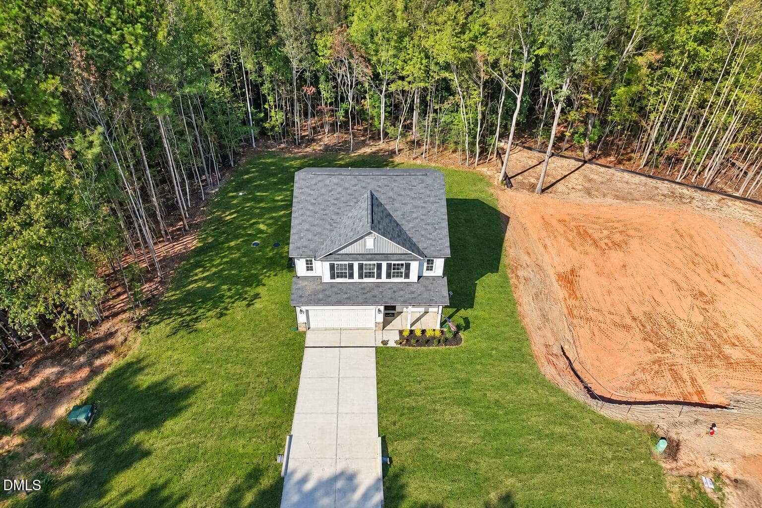 Lush Green Lawn Aerial Home View - 143 Ember Street, Zebulon, NC 27597