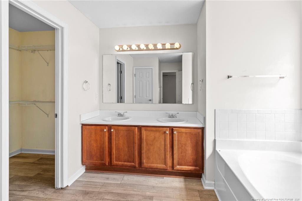 Duel vanitiy and walk in closet - 117 Blue Water Drive, Raeford, NC 28376