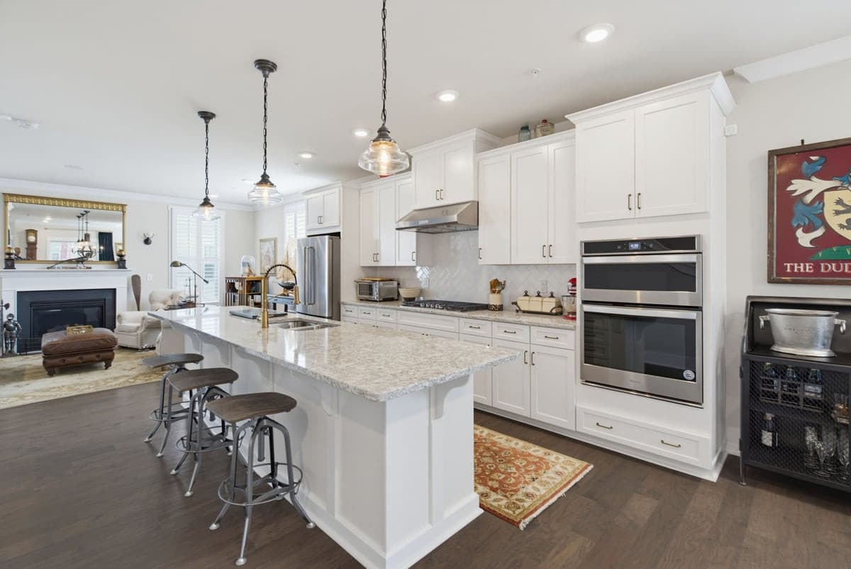 Full Kitchen View w.living room.jpg - 10530 Sablewood Drive 101, Raleigh, NC 27617