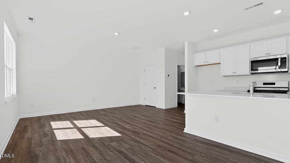 DINING ROOM AND LIVING ROOM - 63 Bee Garden Court, Angier, NC 27501