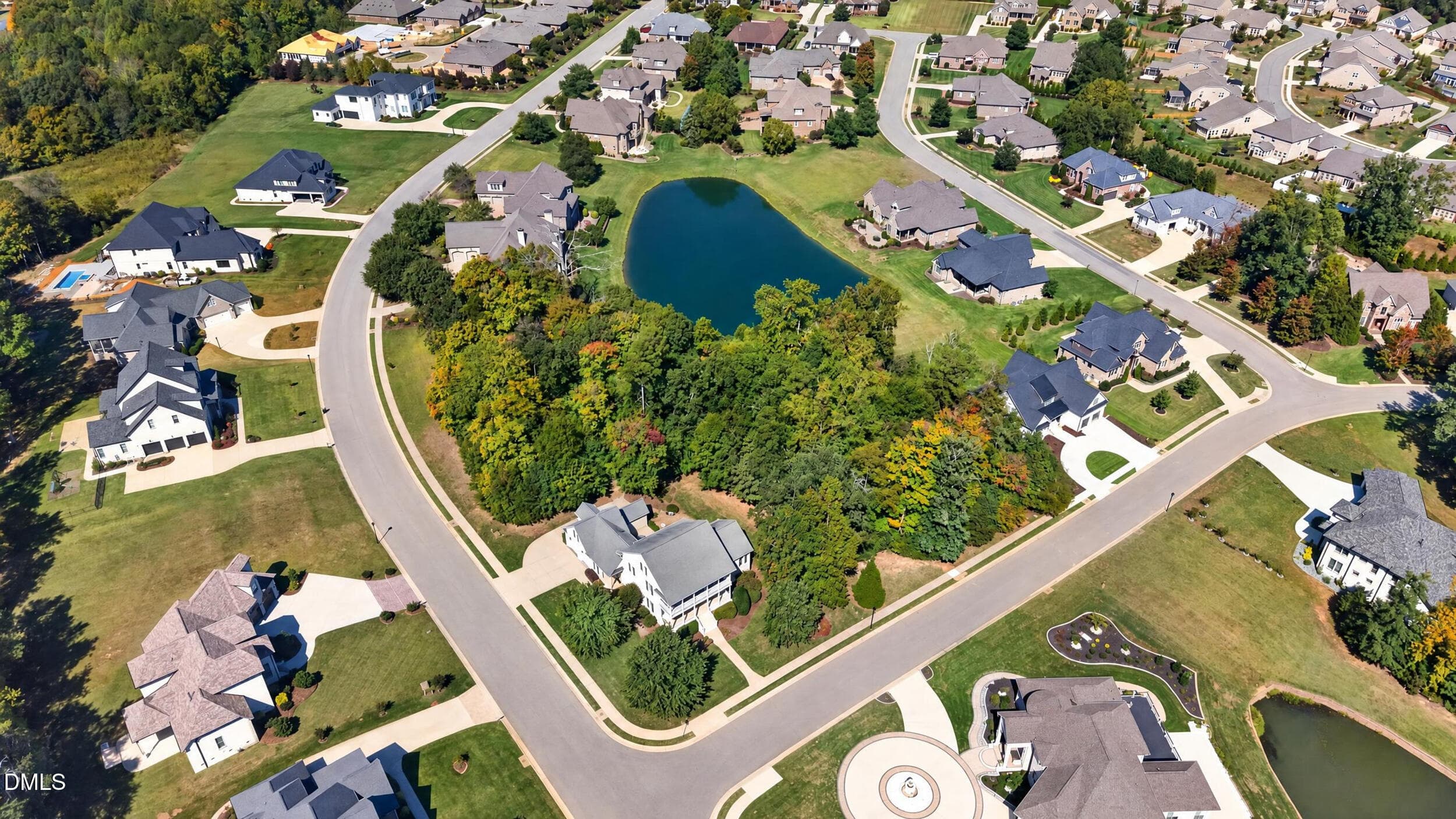 096 - Aerial of Neighborhood and Pond - 1018 Lochshire Drive, Burlington, NC 27215