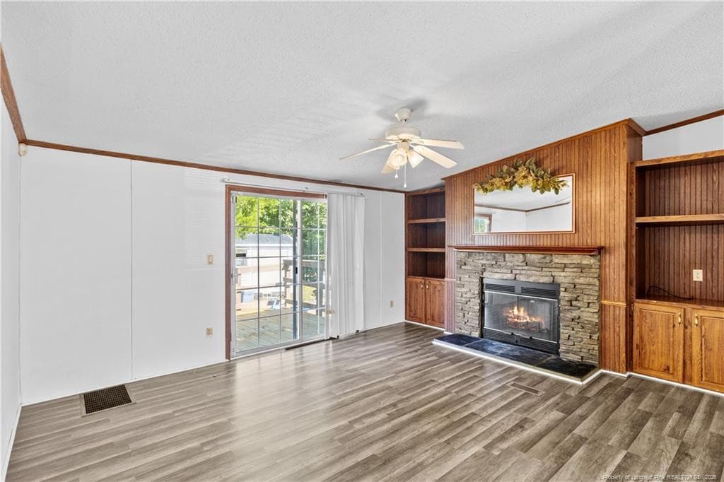 fireplace shown as lit - 179 Grier Drive, Raeford, NC 28376, Raeford