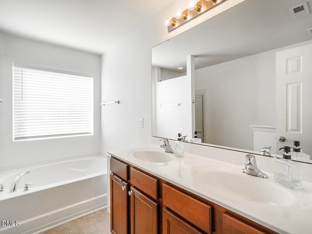 30 203_CollingtonDr PrimaryBath1_MLS - 203 Collington Drive, Mebane, NC 27302, Mebane