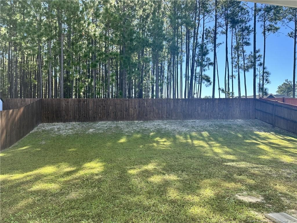 fenced yard - 143 Cromwell Court, Raeford, NC 28376