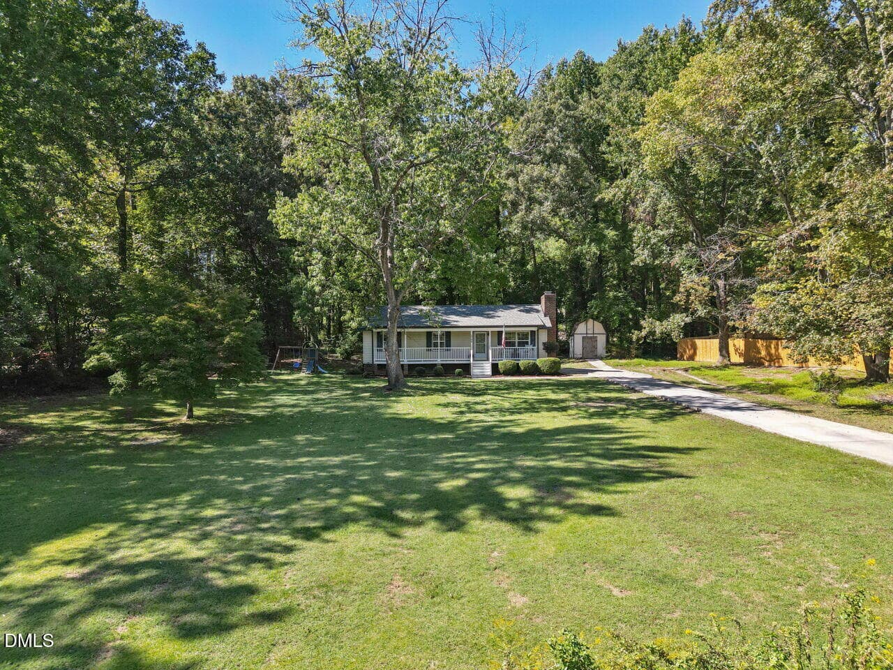 Front yard showing long driveway - 2700 Brantley Drive, Apex, NC 27539, Apex