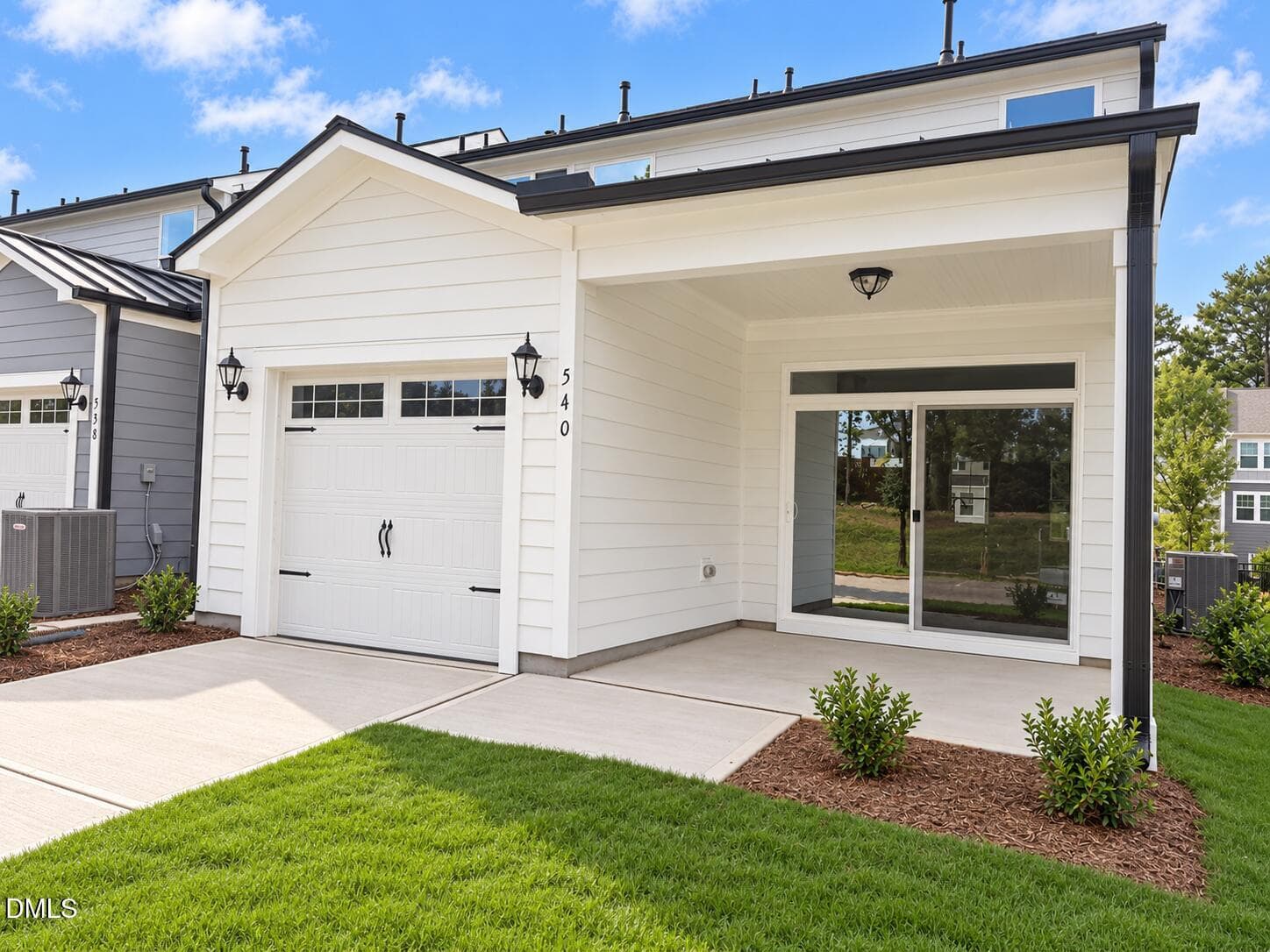 Back Patio and garage close - 540 Traditions Grande Boulevard, Wake Forest, NC 27587