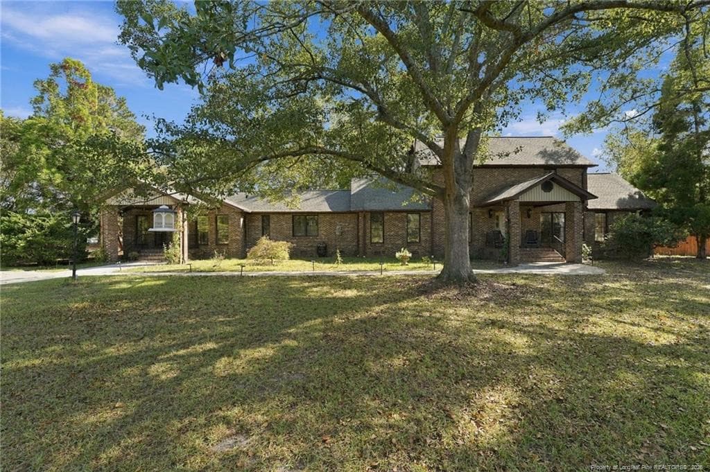 Photo 1 - 5199 Tobacco Road, Orrum, NC 28369