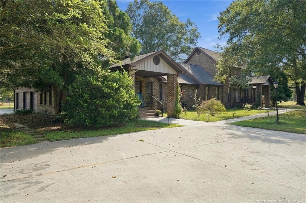 Photo 2 - 5199 Tobacco Road, Orrum, NC 28369