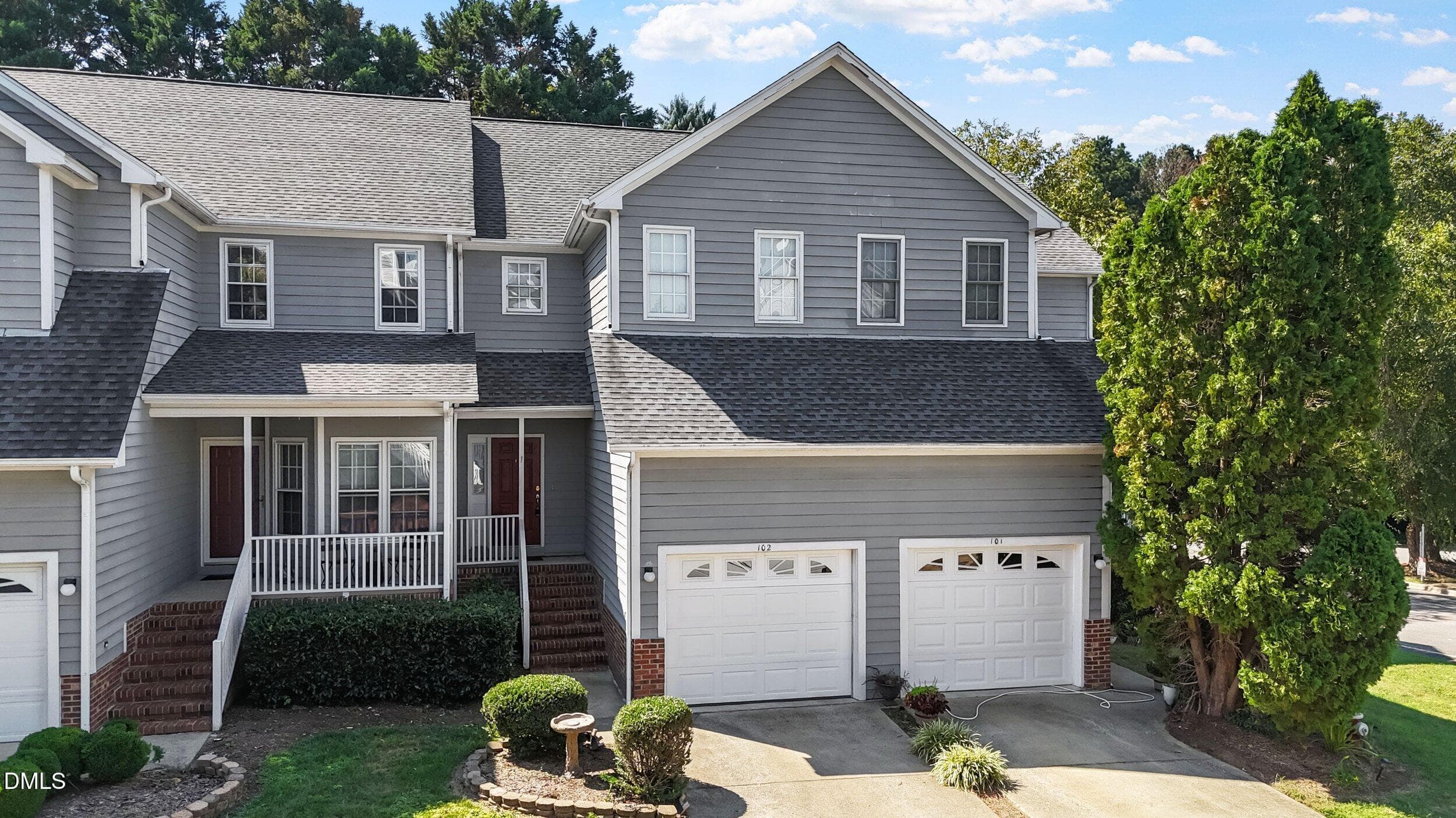 Left side garage and driveway - 8200 Hempshire Place, Raleigh, NC 27613