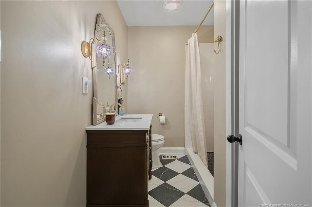 UPDATED HALL BATHROOM - 220 E David Parnell Street, Parkton, NC 28371