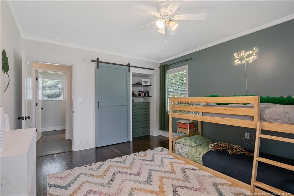 GUEST BEDROOM 2 VIEW W/CLOSET ORGANIZER - 220 E David Parnell Street, Parkton, NC 28371