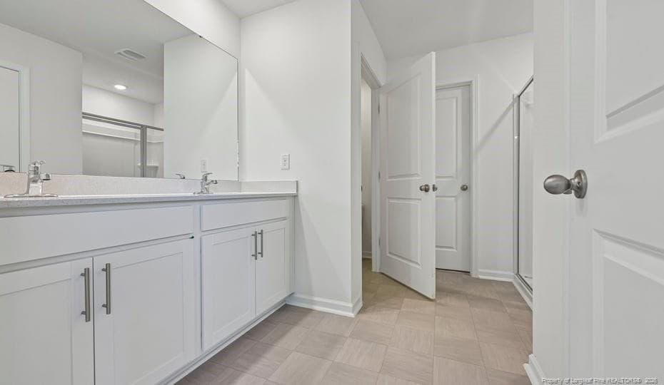 PRIMARY SUITE BATHROOM - 236 Rashford Way, Raeford, NC 28376