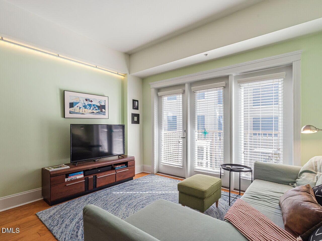 Living Area and Balcony Door - 222 Glenwood Avenue 210, Raleigh, NC 27603, Raleigh